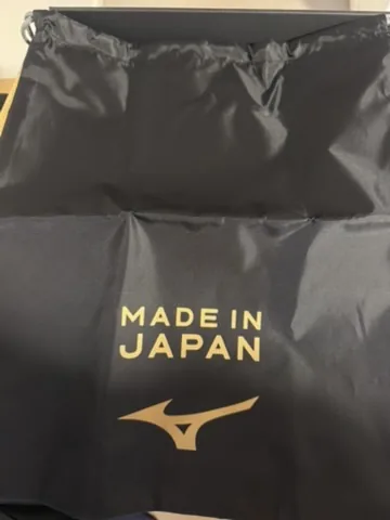 Black Mizuno Made in Japan string bag with gold lettering